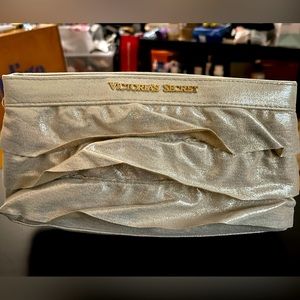 Victoria’s Secret golden clutch with ruffles